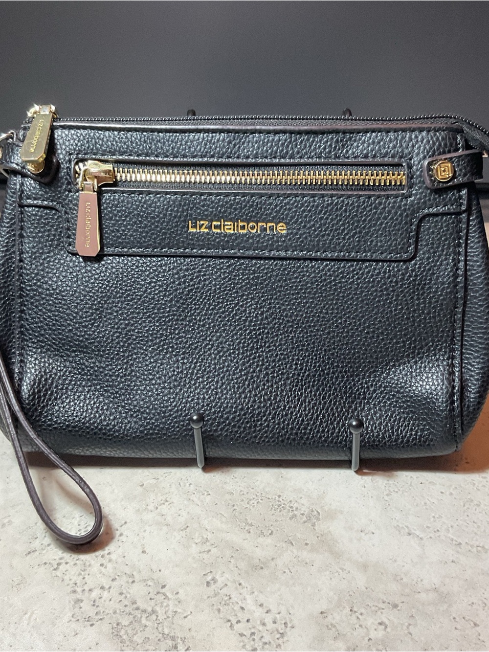 Liz Claiborne  Elly convertible wristlet/wallet gold tone hardware zip closure.